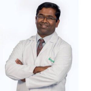 Dr. Mohan Puttaswamy
