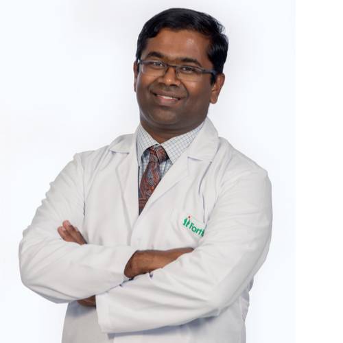 Dr. Mohan Puttaswamy