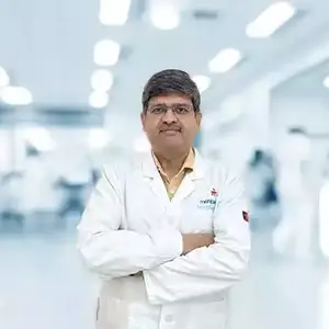 Dr. Parmod Mittal
