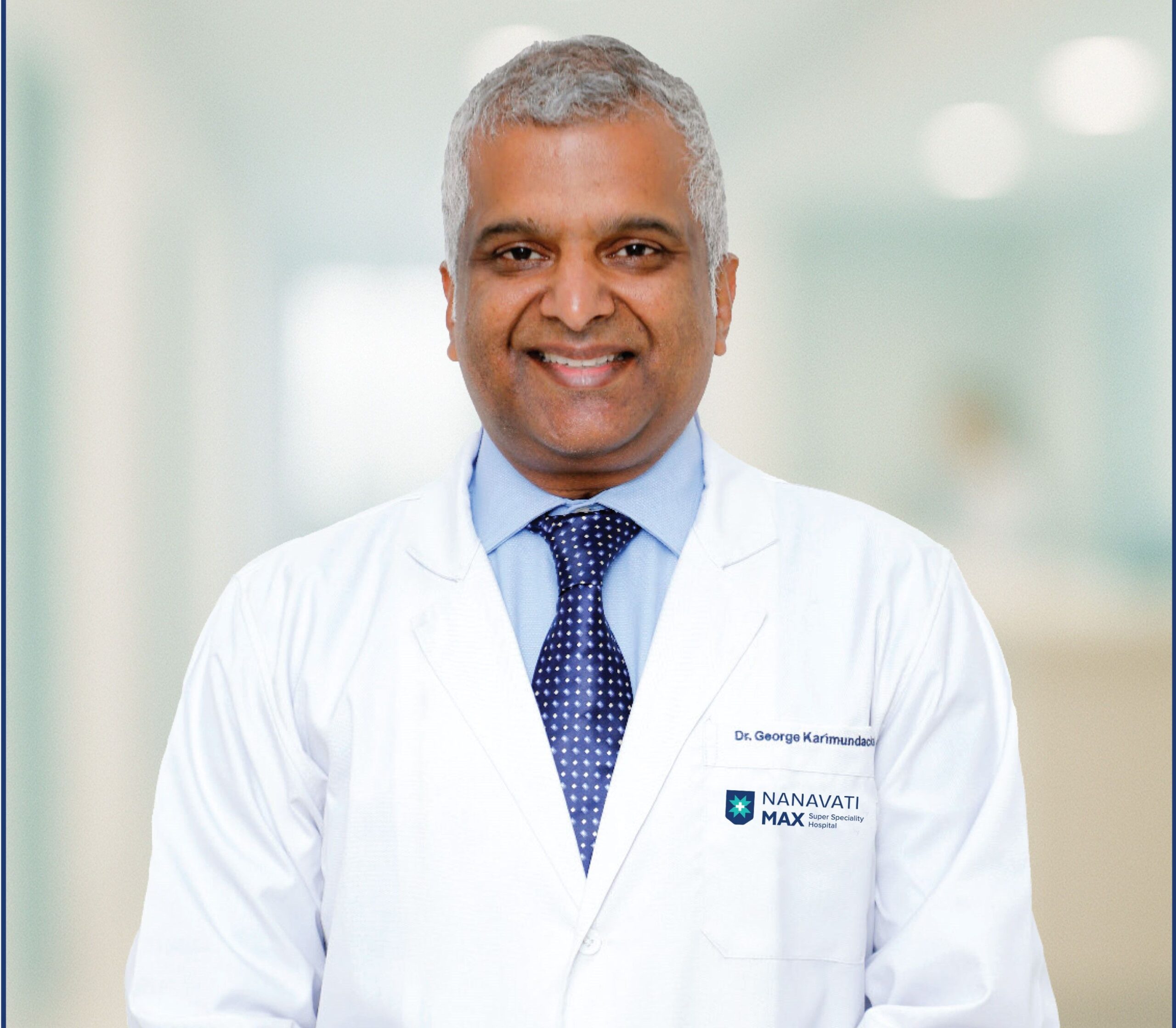 Dr. George Karimundackal