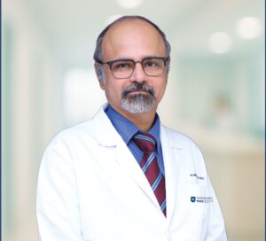Dr. Manmohan Kamat